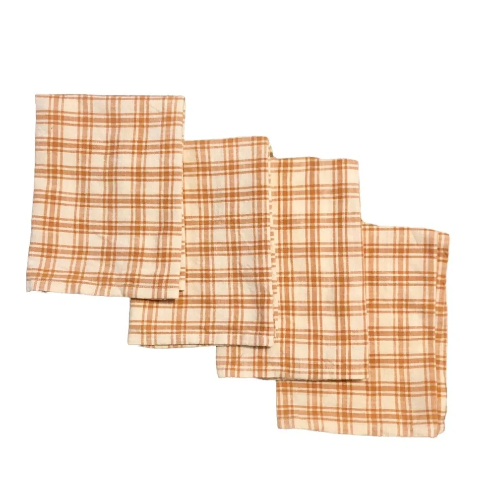 West Elm set of four orange and white checked cloth napkins